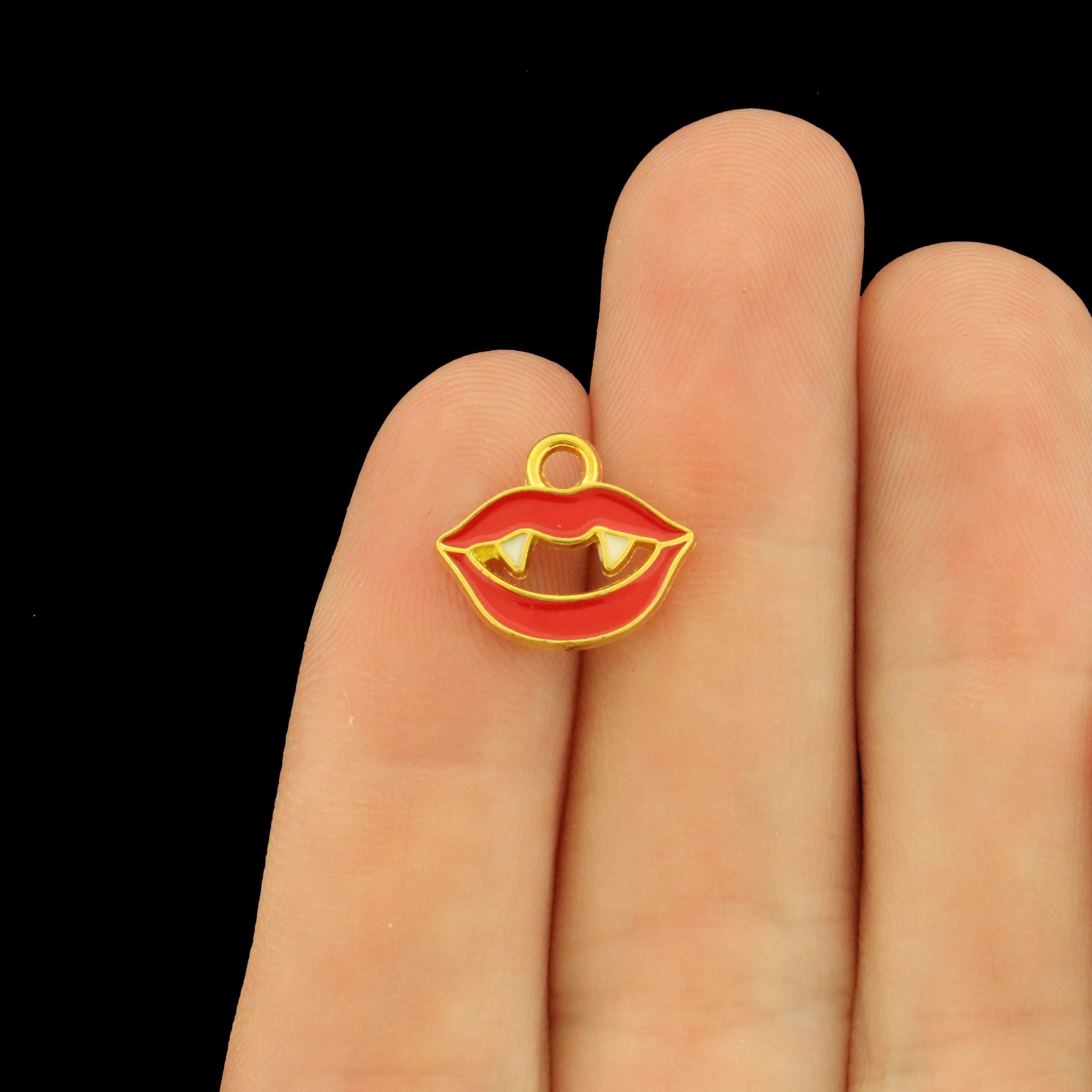 4 Vampire Teeth Gold Tone Enamel Charms - E268