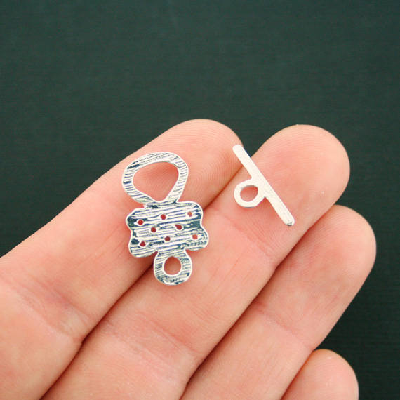 Fermoirs à bascule en ton argent avec nœud celtique 24 mm x 14 mm - 2 jeux de 4 pièces - SC7182