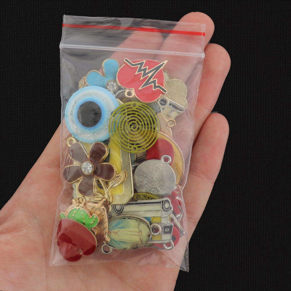 LIQUIDATION 100 breloques assorties de bronze argenté antique et ton or moins que le prix de gros sac à saisir 90 % de réduction sur GRAB10