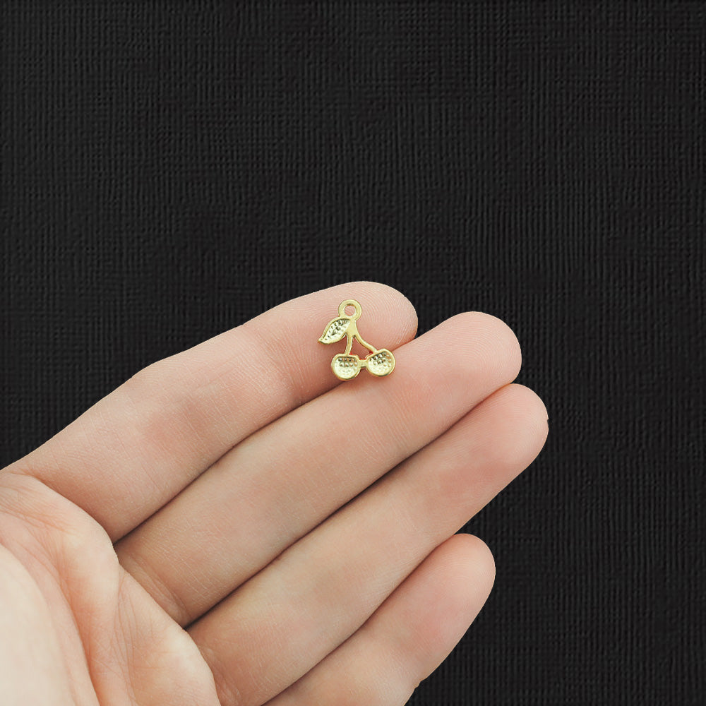 10 breloques en émail ton or cerise - E1102