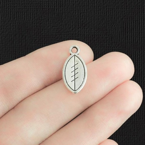10 Football Antique Silver Tone Charms 2 Sided - SC2891