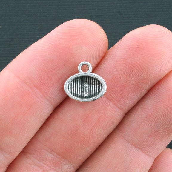 10 Football Antique Silver Tone Charms - SC3954