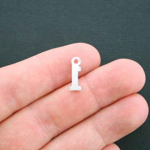 10 breloques argentées antiques numéro 1 - SC4423