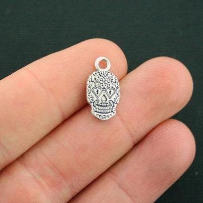 10 breloques argentées antiques tête de mort 2 faces - SC6599