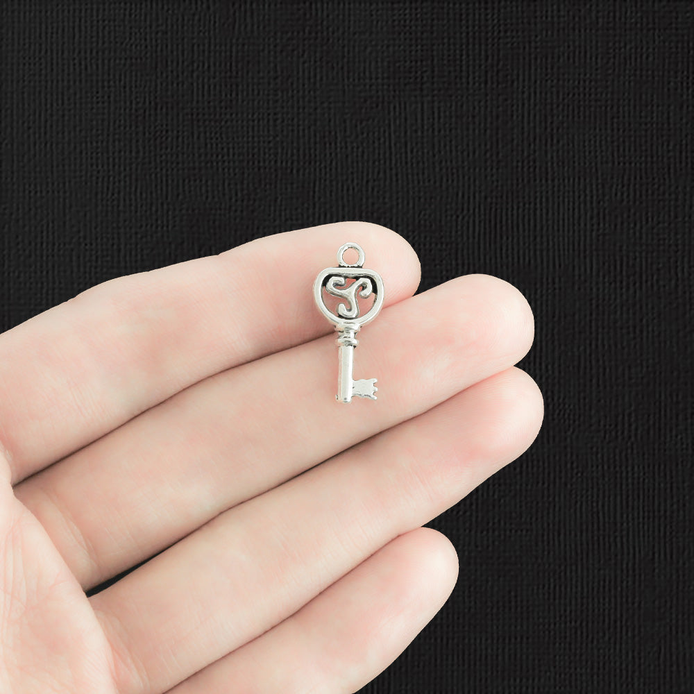 12 Key Antique Silver Tone Charms 2 Sided - SC5141