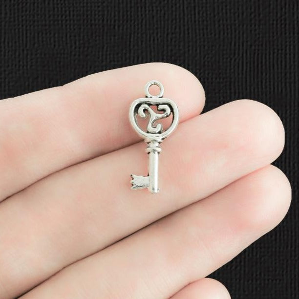 12 Key Antique Silver Tone Charms 2 Sided - SC5141