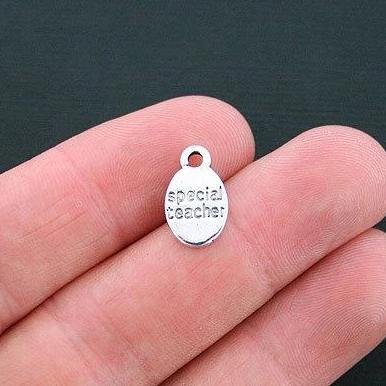 12 breloques de ton argent antique enseignant - SC4540