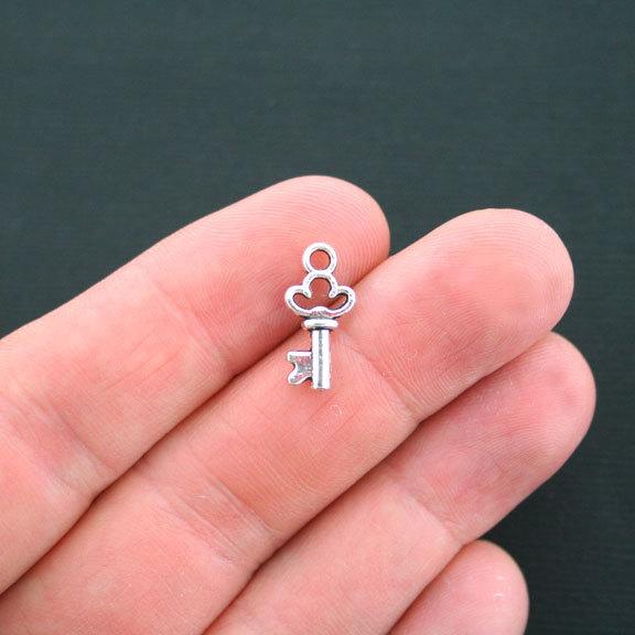 15 Key Antique Silver Tone Charms 2 Sided - SC3255