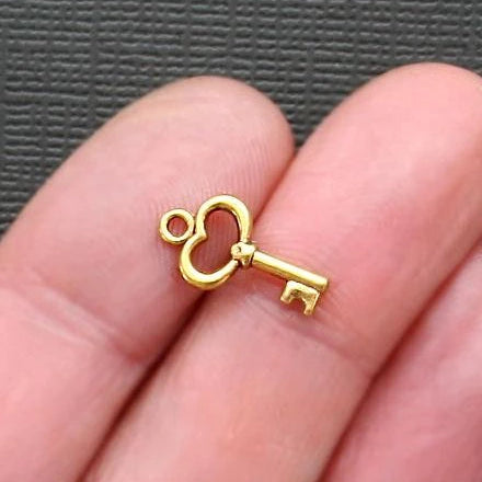 18 Key Antique Gold Tone Charms 2 Sided - GC032
