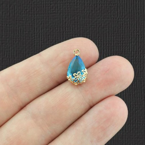 2 Blue Glass Pendant Gold Tone Charms - Z101