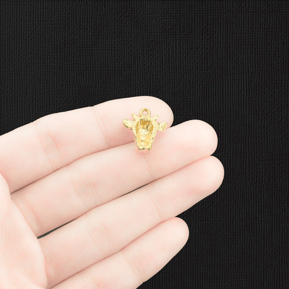 2 breloques vache en émail doré - E1280