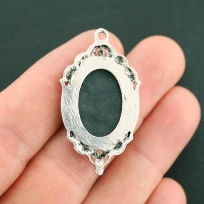 2 breloques en émail argenté cabochon rose - E323