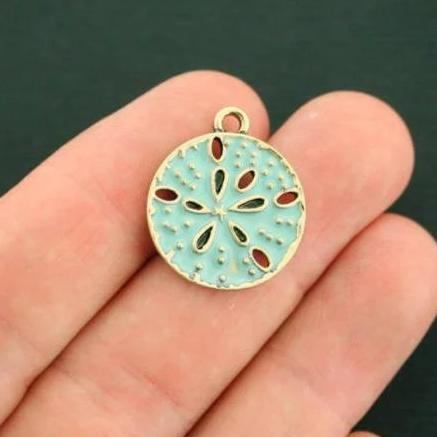 2 breloques en émail doré dollar des sables - E127