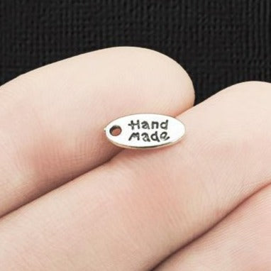 20 Hand Made Antique Silver Tone Charms - SC5557