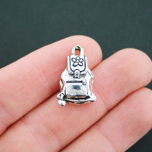 Sac à dos 4 breloques ton argent antique 3D - SC5146