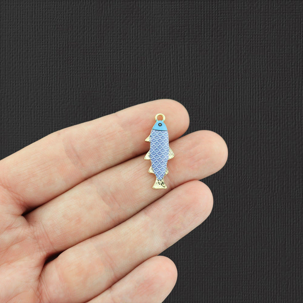 4 breloques en émail doré poisson bleu - E463