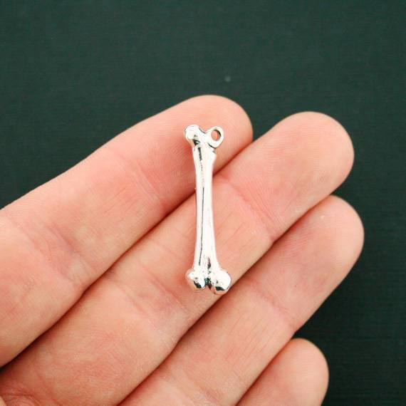 4 Bone Antique Silver Tone Charms 3D - SC6818