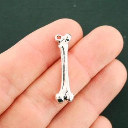 4 Bone Antique Silver Tone Charms 3D - SC6818