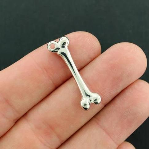 4 Bone Silver Tone Charms 2 Sided - SC7852