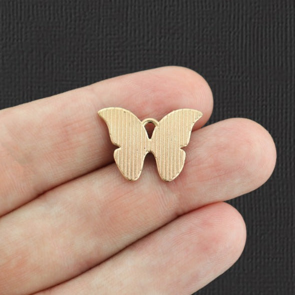 5 breloques en émail doré papillon violet - E1079