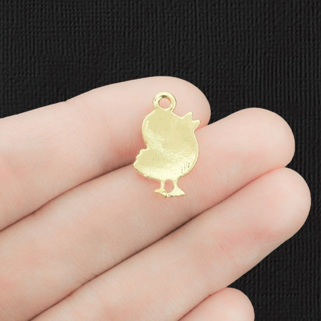 4 breloques en émail doré poussin - E1243