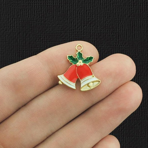 4 breloques en émail doré avec cloches de Noël - E1123
