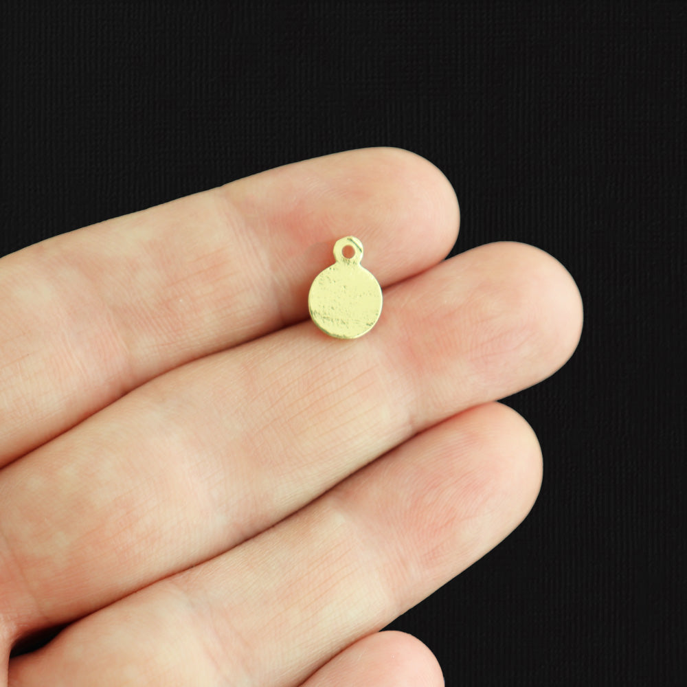 4 Compass Gold Tone Charms - GC183