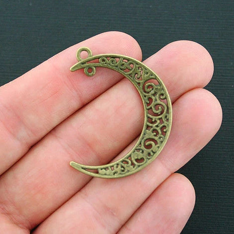 4 breloques de ton bronze antique croissant de lune - BC1339