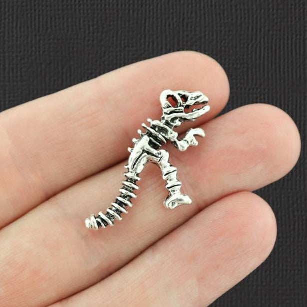 4 Dinosaur Bones Antique Silver Tone Charms 2 Sided - SC7486