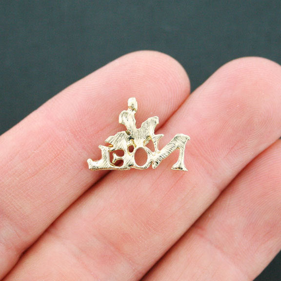 4 breloques en émail doré Noel - E089