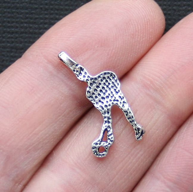 4 Ringette Player Antique Silver Tone Charms - SC3072