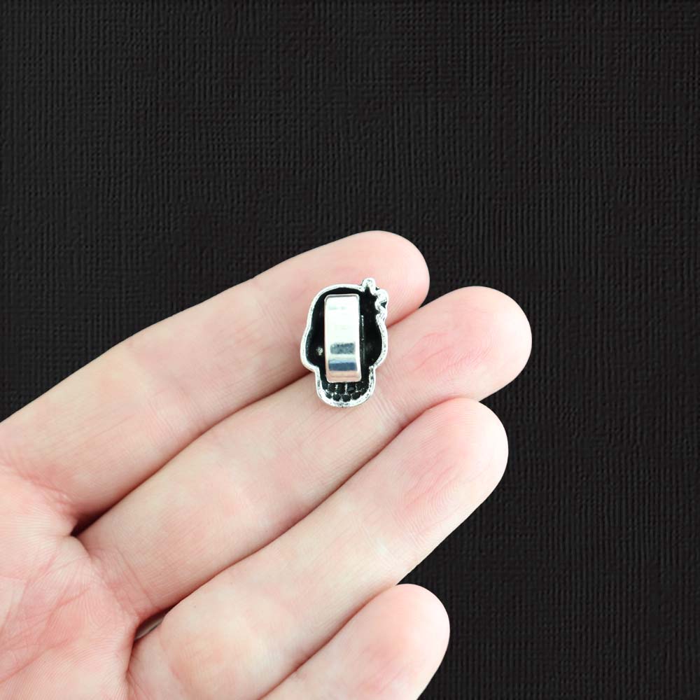 4 Skull Antique Silver Tone Charms - SC693