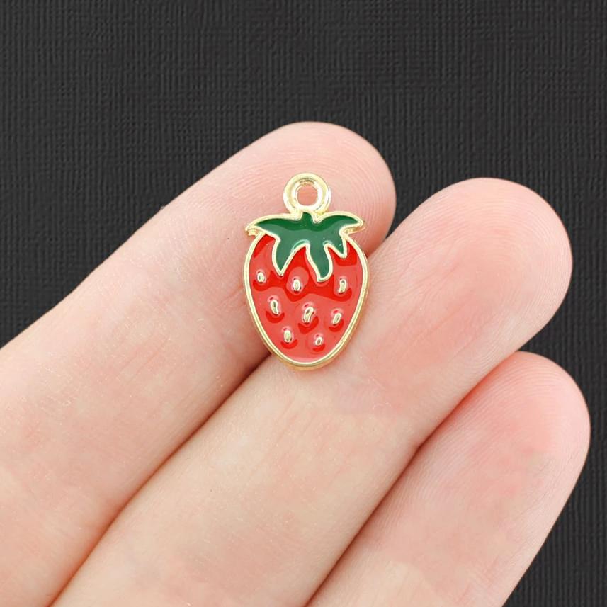 4 breloques en émail ton or fraise - E759