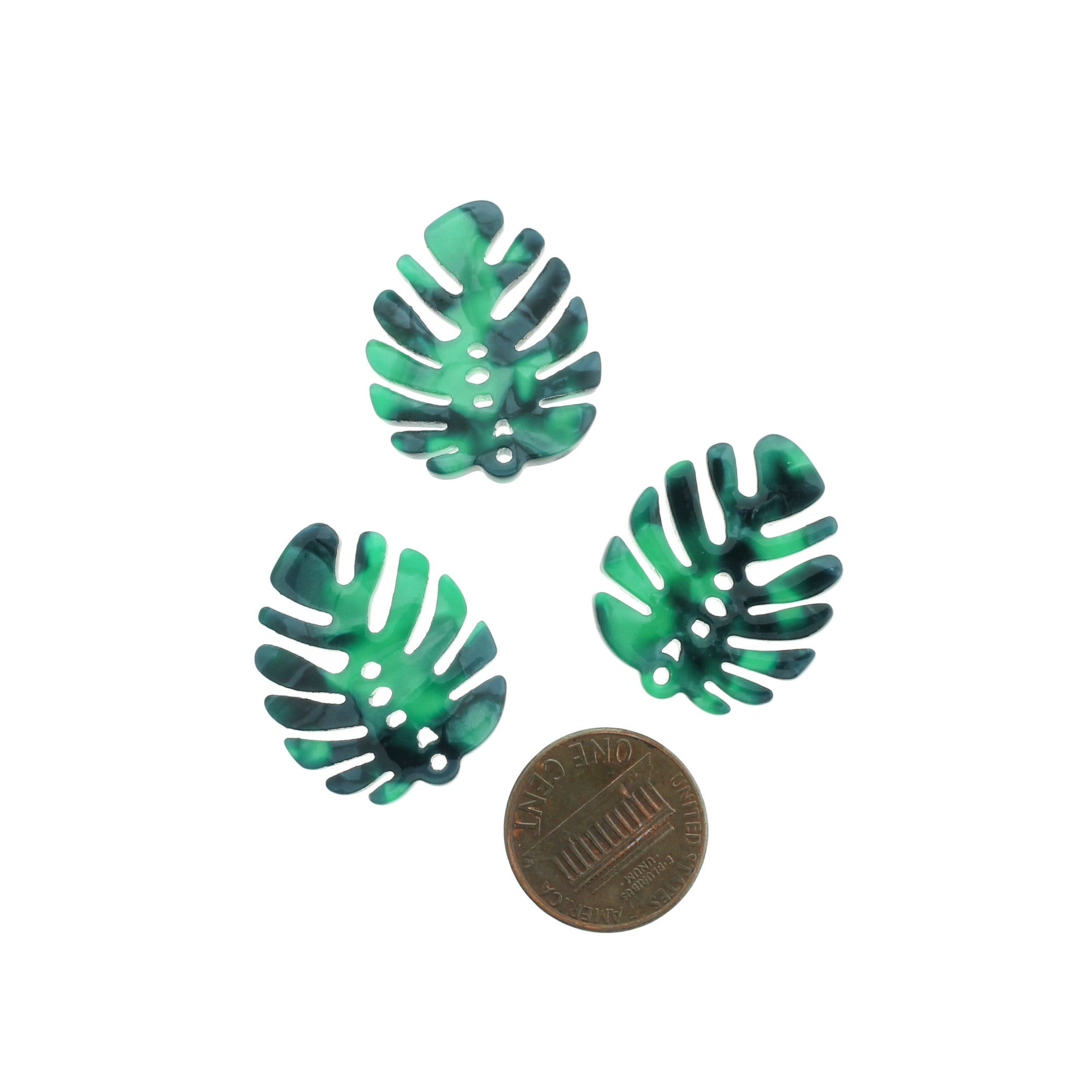 4 breloques en résine de feuilles tropicales - K300