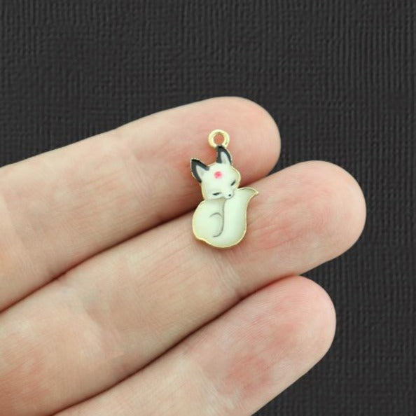 4 breloques en émail doré renard blanc - E1036