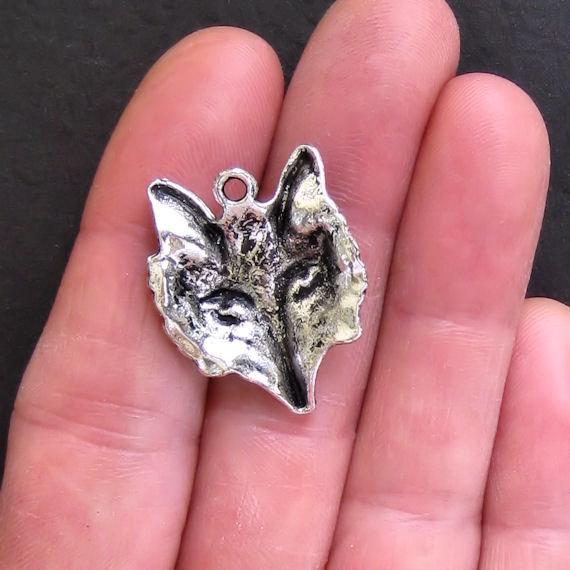 4 Wolf Antique Silver Tone Charms - SC570