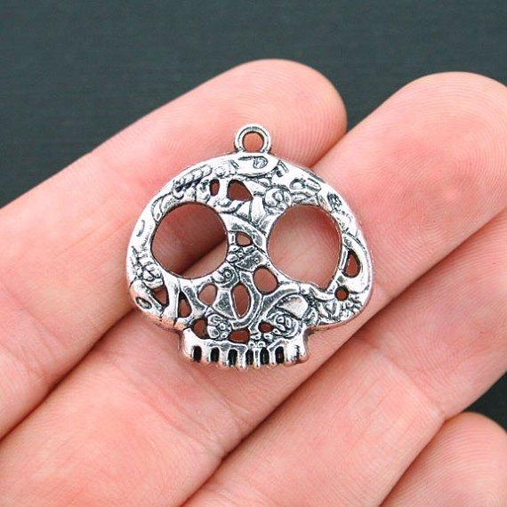 5 breloques argentées antiques tête de mort - SC4137
