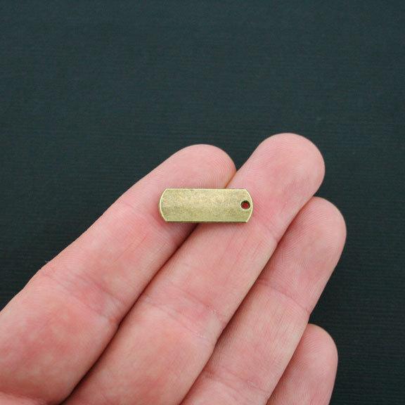 6 Believe Antique Bronze Tone Charms - BC771