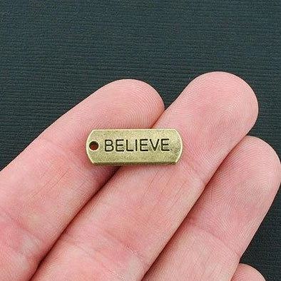 6 Believe Antique Bronze Tone Charms - BC771