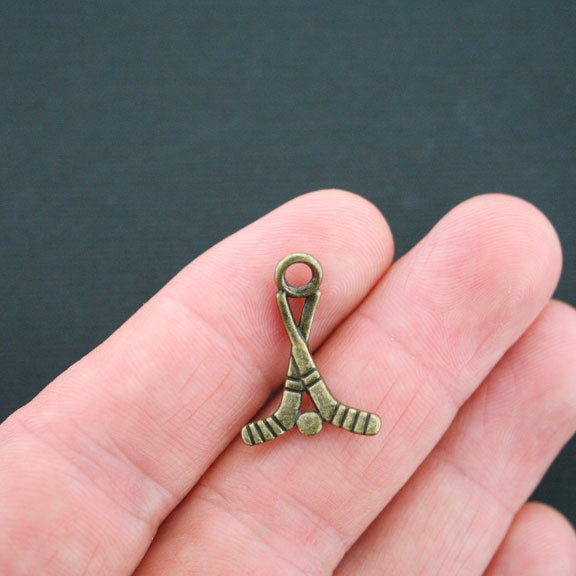 6 Hockey Antique Bronze Tone Charms 2 Sided - BC170