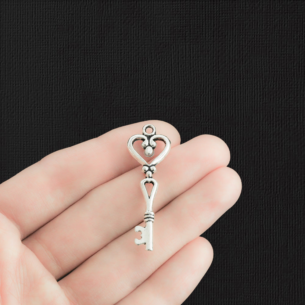 6 Key Antique Silver Tone Charms 2 Sided - SC1387