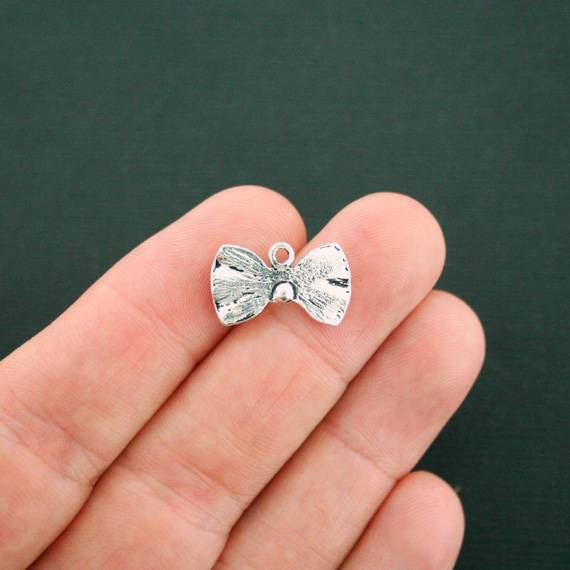 8 Bowtie Antique Silver Tone Charms - SC7348