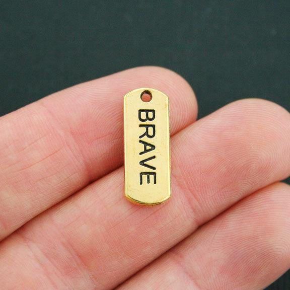 8 Brave Antique Gold Tone Charms - GC642