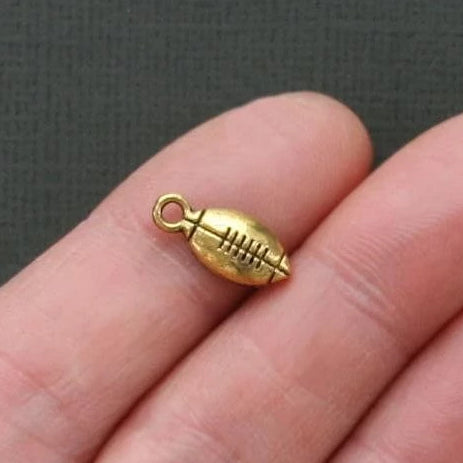 8 Football Antique Gold Tone Charms - GC093