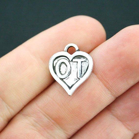 8 Occupational Therapist Antique Silver Tone Charms - SC3900