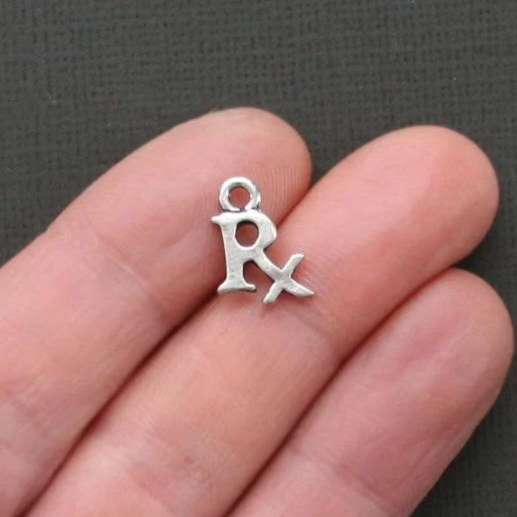 8 RX Antique Silver Tone Charms - SC1791