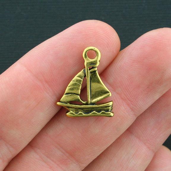 8 Sailboat Antique Gold Tone Charms 2 Sided - GC411
