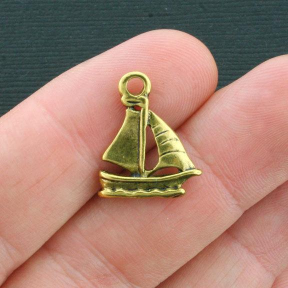 8 Sailboat Antique Gold Tone Charms 2 Sided - GC411