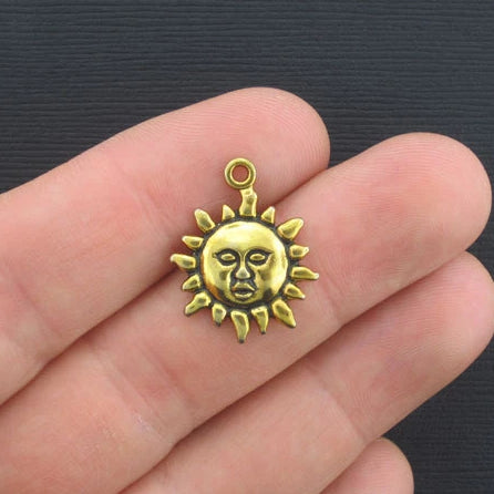 8 breloques dorées antiques soleil - GC261