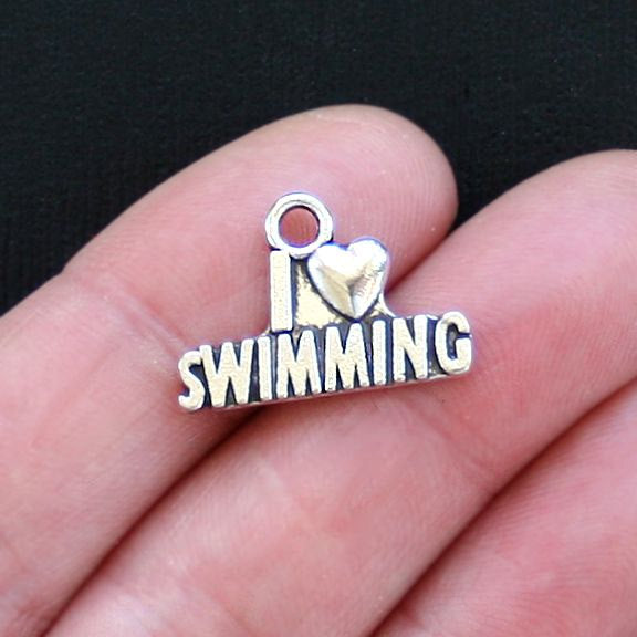 8 Swimming Antique Silver Tone Charms - SC2675